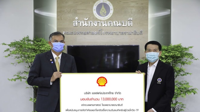 Mr. Panun Prachuabmoh, (left) Professor Piyamitr Sritara, (right),