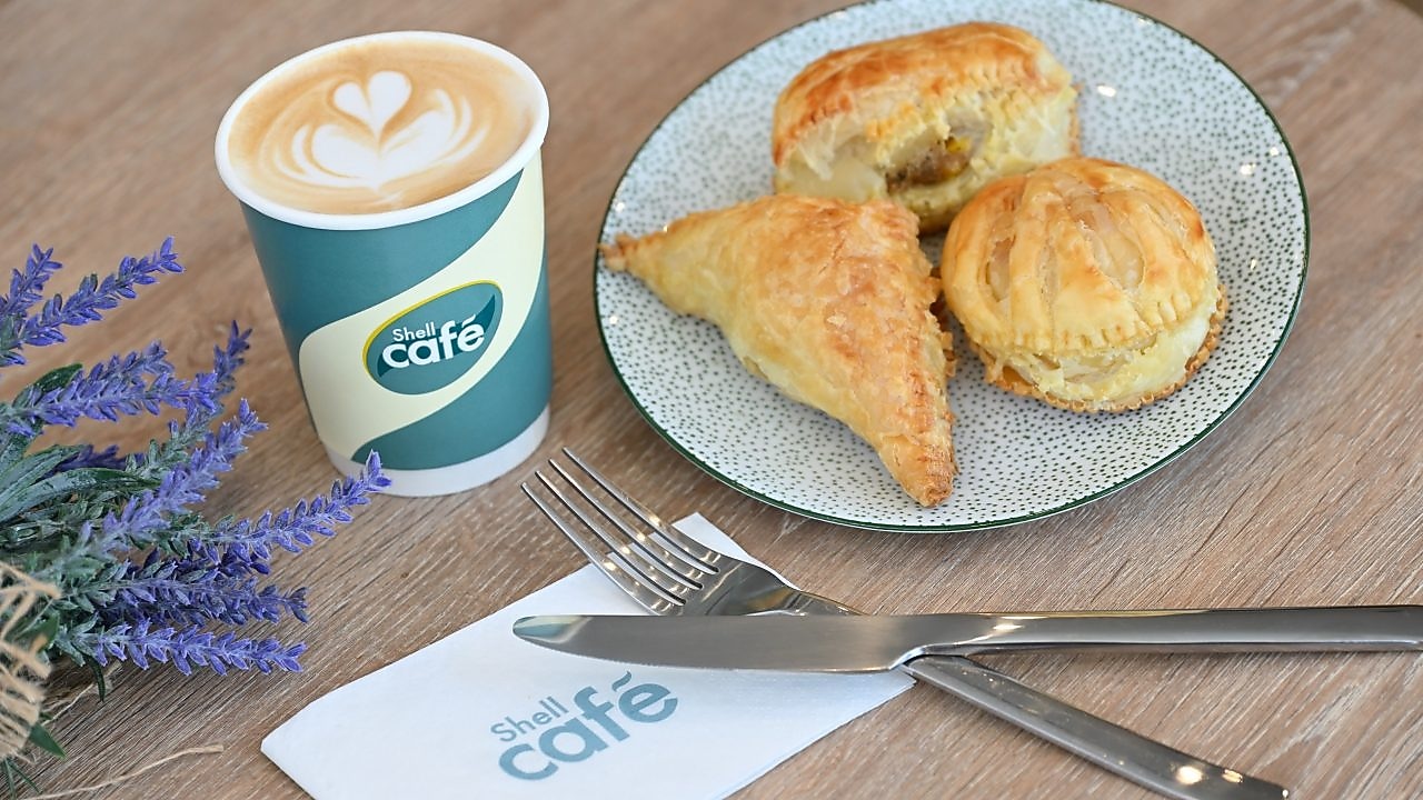 Aroma-rich coffee and warm, inviting treats – the perfect combination to give a boost to your day, one sip and bite at a time.