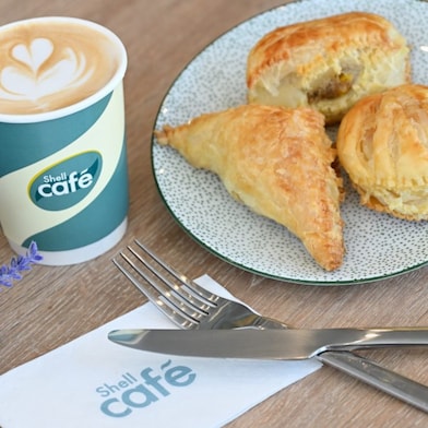 Aroma-rich coffee and warm, inviting treats – the perfect combination to give a boost to your day, one sip and bite at a time.