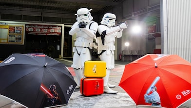 Join the Star Wars universe by collecting mini colorful travel suitcases and LED lightsaber umbrellas.