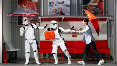 Rain or shine, stay prepared with a lightsaber umbrella and a mini suitcase—your perfect travel companions for every journey.