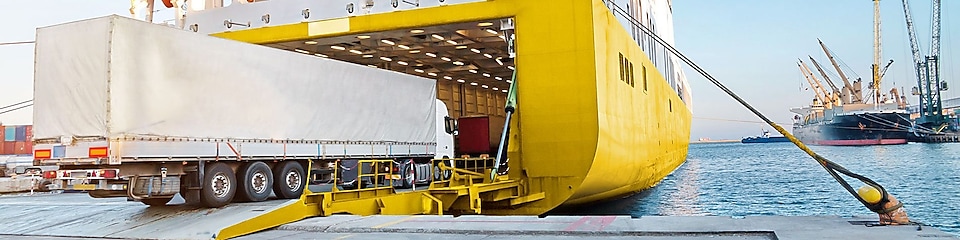 cargo ship transporting truck