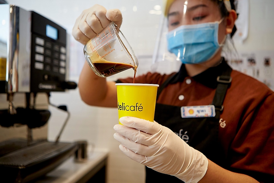 Shell Staff making coffee with all precautions