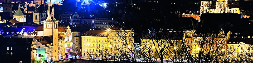A view of the city of Prague at night
