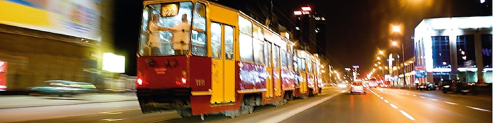 Tram on the street in Warsaw at night