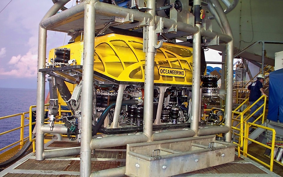 A remotely operated vehicle at a Shell drilling site. The vehicle is lowered to its target depth in a cage, and then released. It drives with its lights and cameras on looking for animals to film at depth intervals of 150m (500 feet).