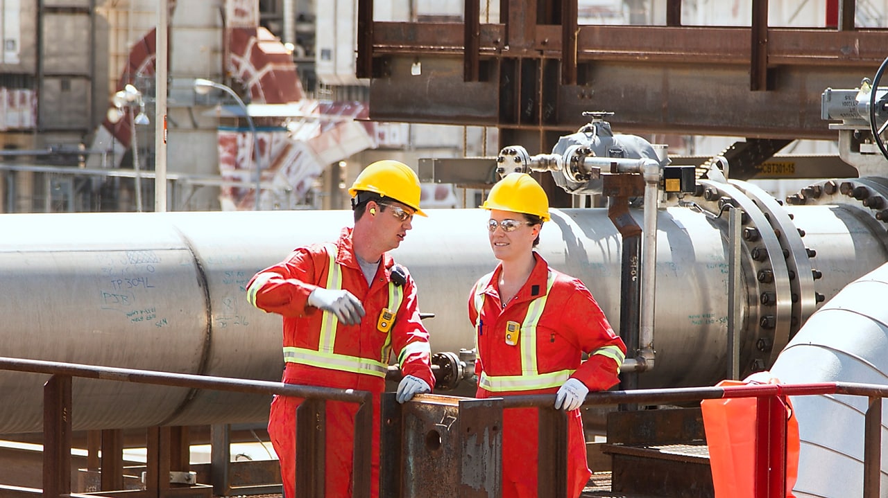 Two people in factory