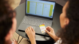 Girl with shell card in her hand