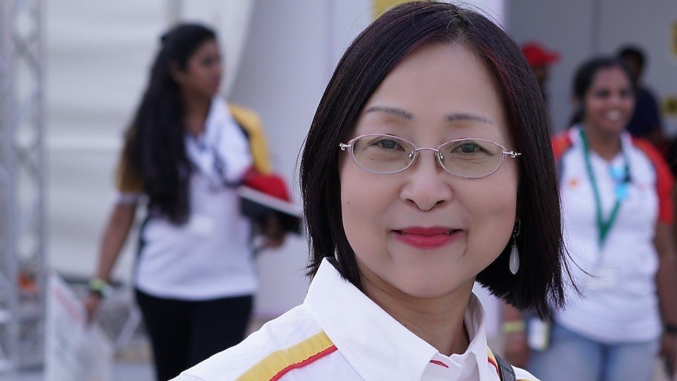 Ms. Liu Xiaowei smiling for a photo